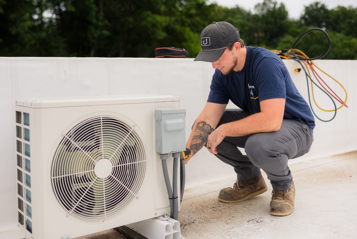 Callison technician wiring an outdoor electrical disconnect in Staunton, Virginia