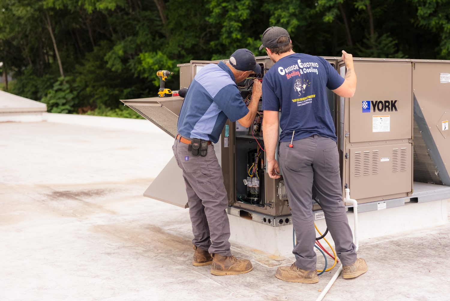 Callison HVAC technicians servicing a rooftop York unit during a maintenance call in Augusta County, Virginia