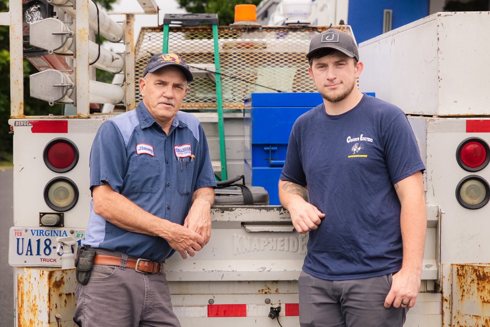 Jimmy and the Callison Electric Heating & Cooling crew standing at their service truck in Staunton, Virginia